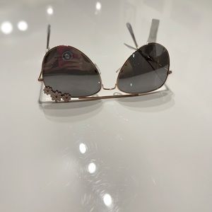 Brand new tag on daisy sunglasses from Windsor